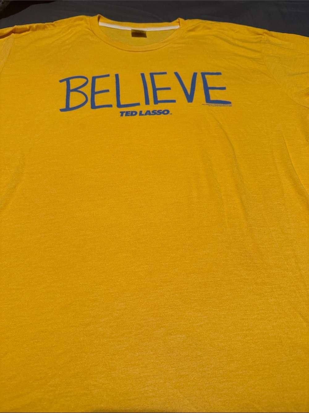Homage BELIEVE Ted Lasso Graphic Tee - Yellow with Blue Print